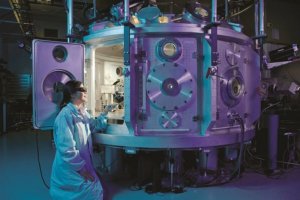 Scientist working with machine